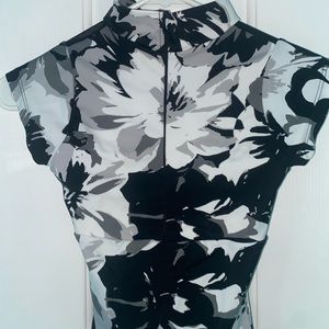 Beautiful Class-In brand dance leotard, 1/4 zip cap sleeve.